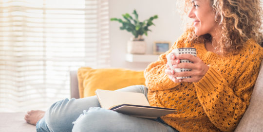 relaxed woman at home with coffee