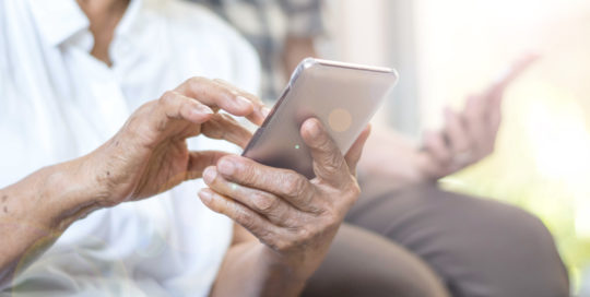 elderly people using smartphones