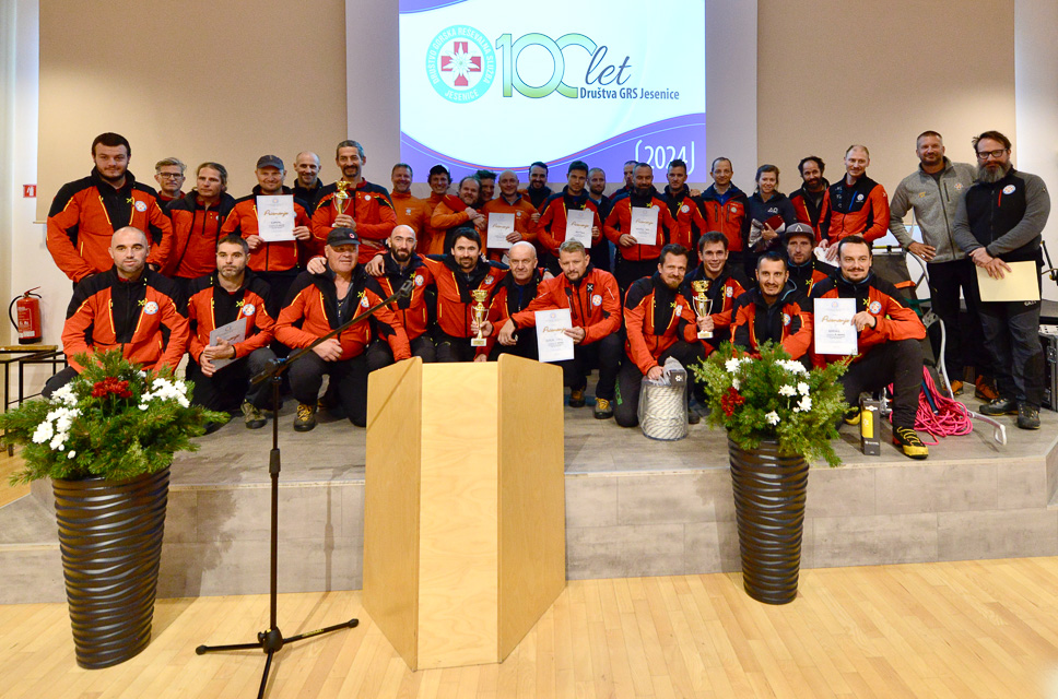 Slovenian Mountain Rescue Association (GRZS). Group photo of GRZS mountain rescuers receiving special honors.