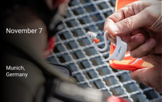 In-ear sensor c-med°alpha in the hands of a rescuer.